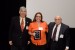 Prof. Grandon Gill, Chair of the Award Ceremony, and Dr. Nagib Callaos, General Chair, giving Dr. Jennifer Styron a plaque "In Appreciation for Delivering a Great Keynote Address at a Plenary Session."